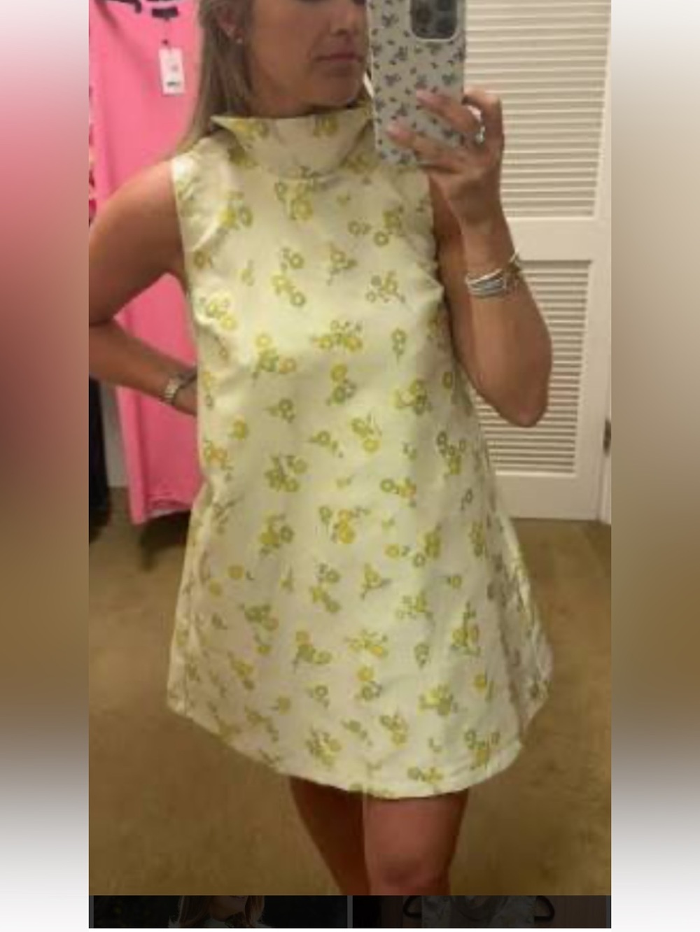 Can fit a small too. Buru Cream Floral A-Line Dress with H